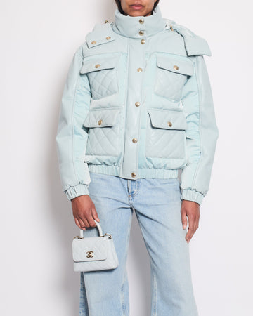 *HOT* Pearl Street Bags Chanel Baby Blue Leather Puffer Jacket with Four Quilted Pockets, Hood and Gold CC Logo Button Details Size FR 36 (UK 8)