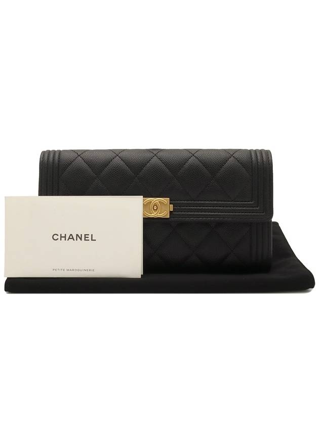 Black caviar gold boy long flap wallet Chanel