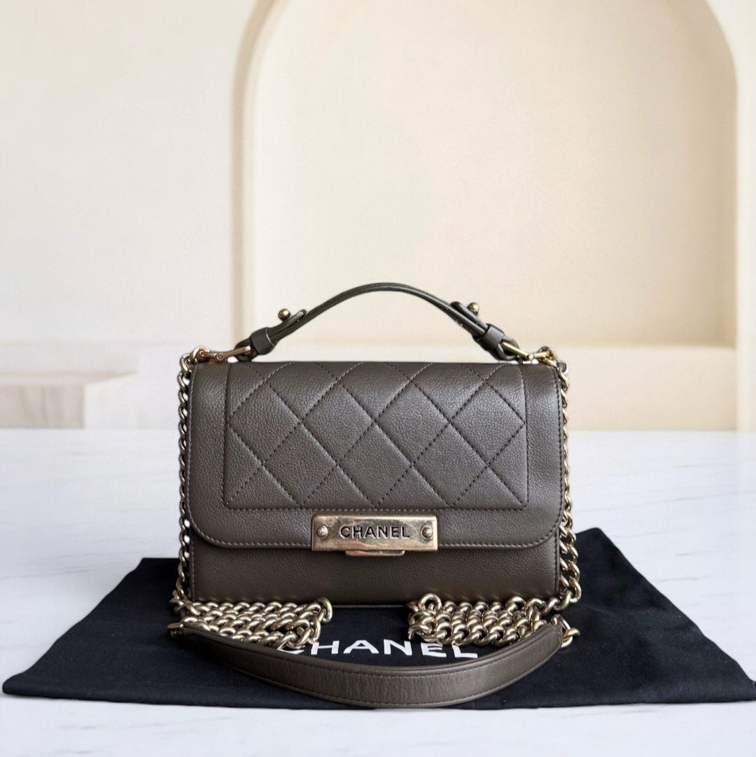 Chanel Label Click Small - Quilted CalBNkin Dark Green Gold Hardware Series 23