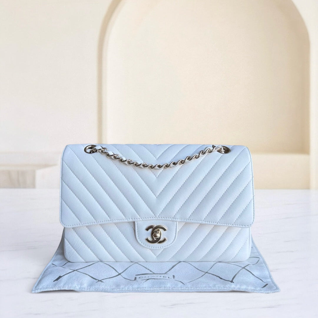 Chanel Classic Flap Medium - Togo/epsom/caviar/clemence/callfskin/cowhide/lambskin Chevron Grained CalBNkin White Gold Hardware Series 31