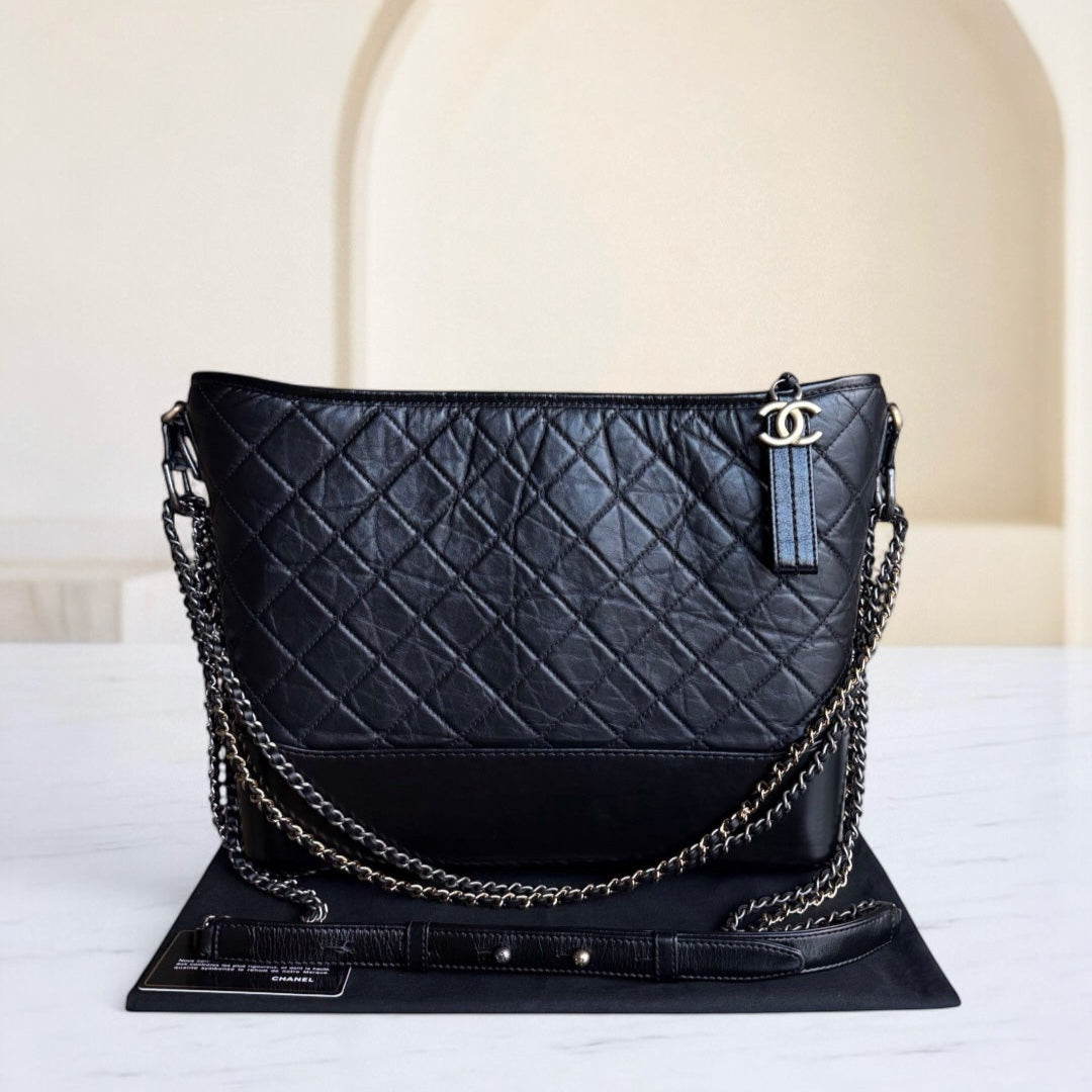 Chanel Gabrielle Large - Quilted Aged CalBNkin Black Two-tone Gold Hardware Series 24