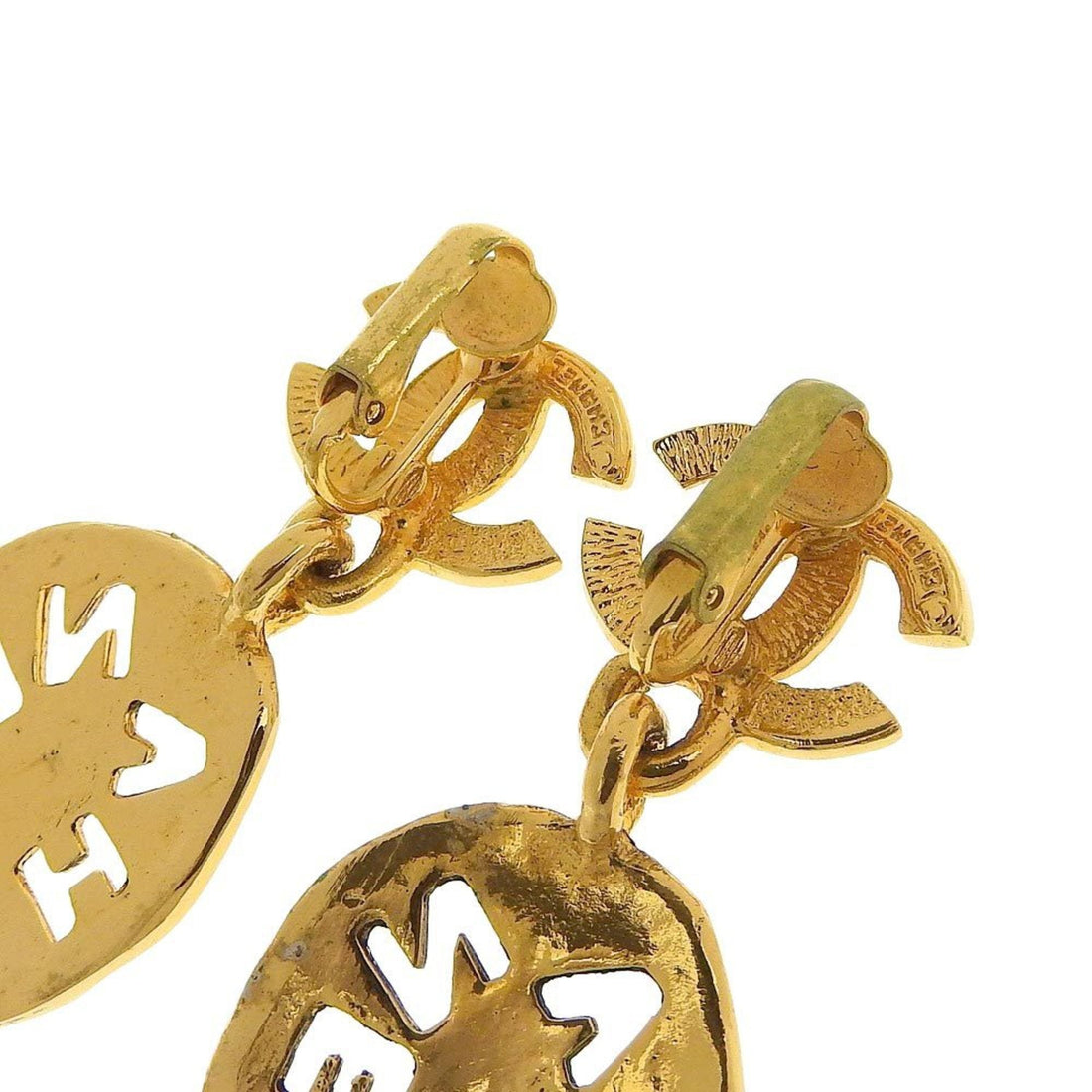 Chanel earrings here mark gold logo