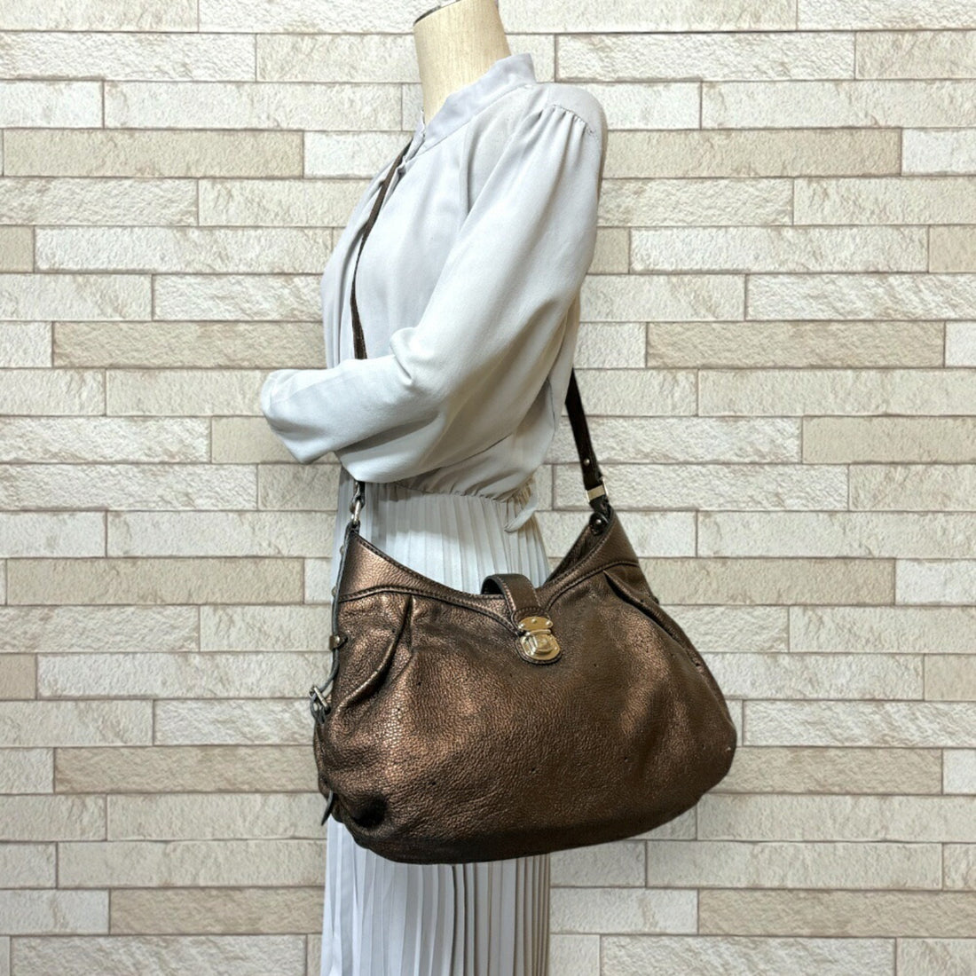 Louis Vuitton  Mahina Leather Shoulder Bag