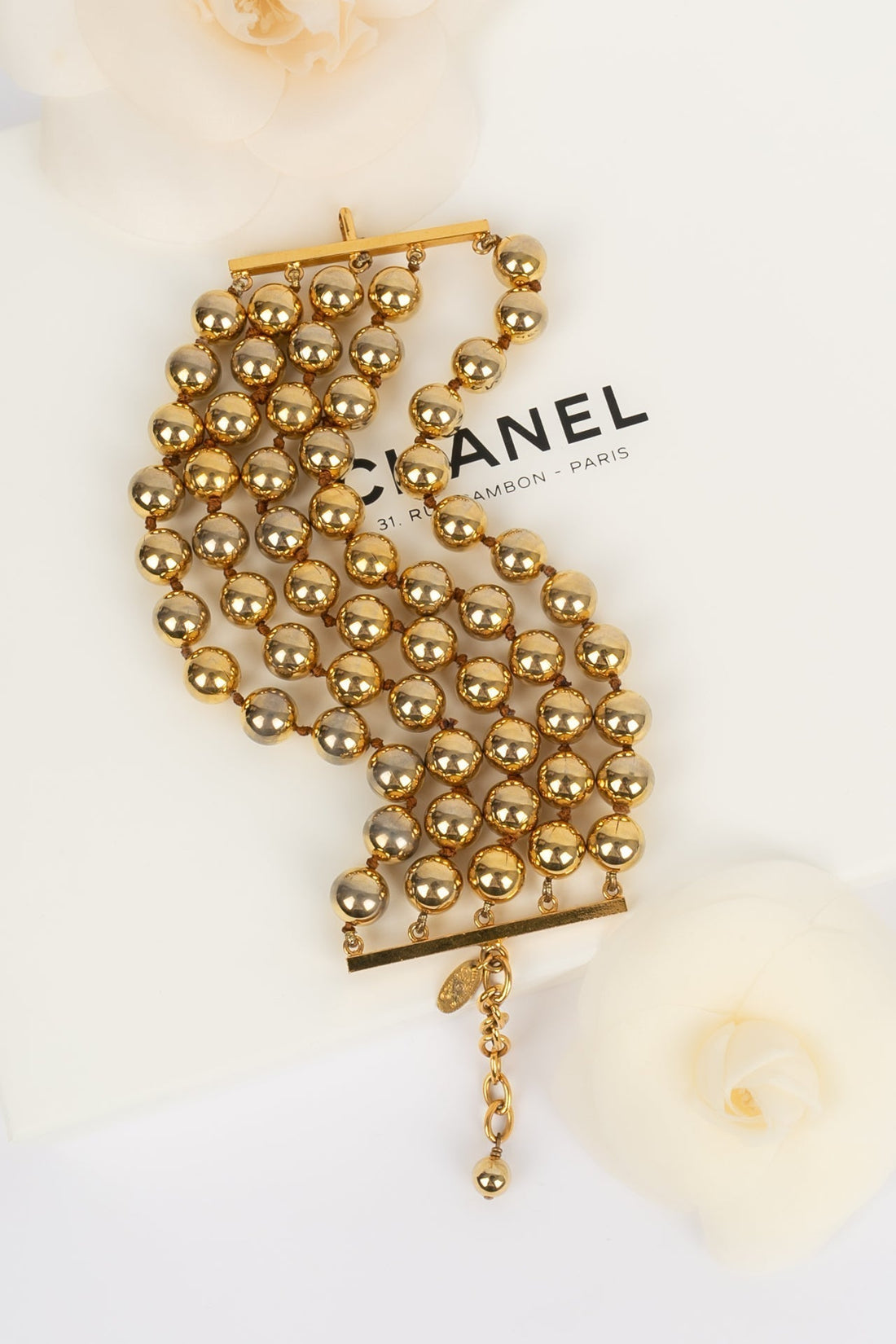 Bracelet de perles dor?©es Chanel