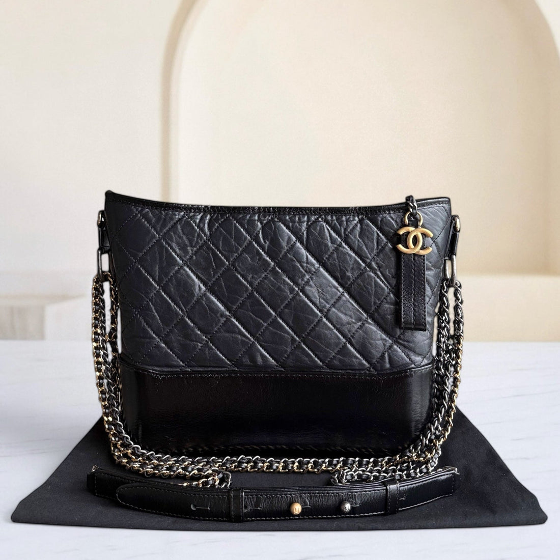 Chanel Gabrielle Medium - Quilted Aged CalBNkin Black Two-tone Gold Hardware Series 25