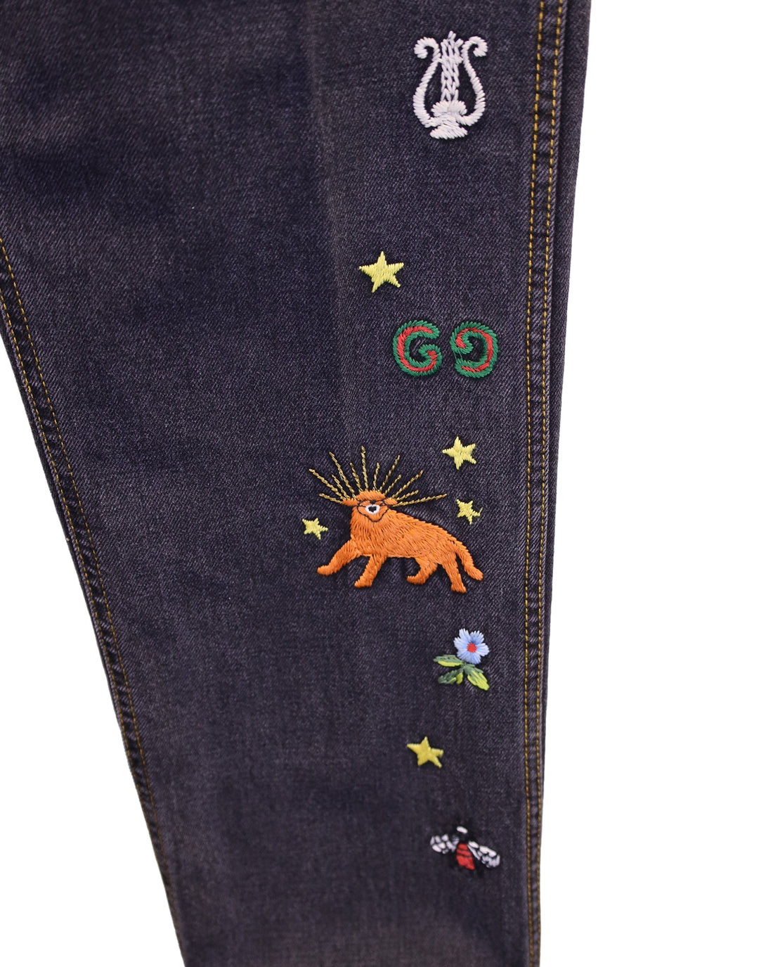 Gucci Embroidered Motif Slim-fit Jeans In Navy Blue Cotton