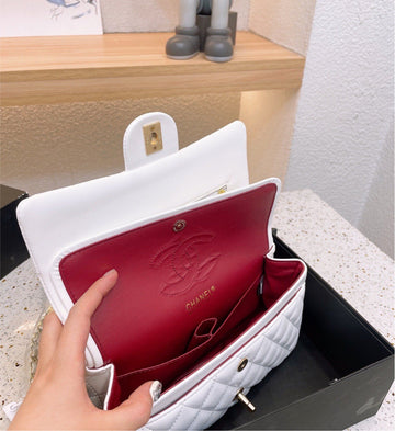 White  Chanel woman handbag