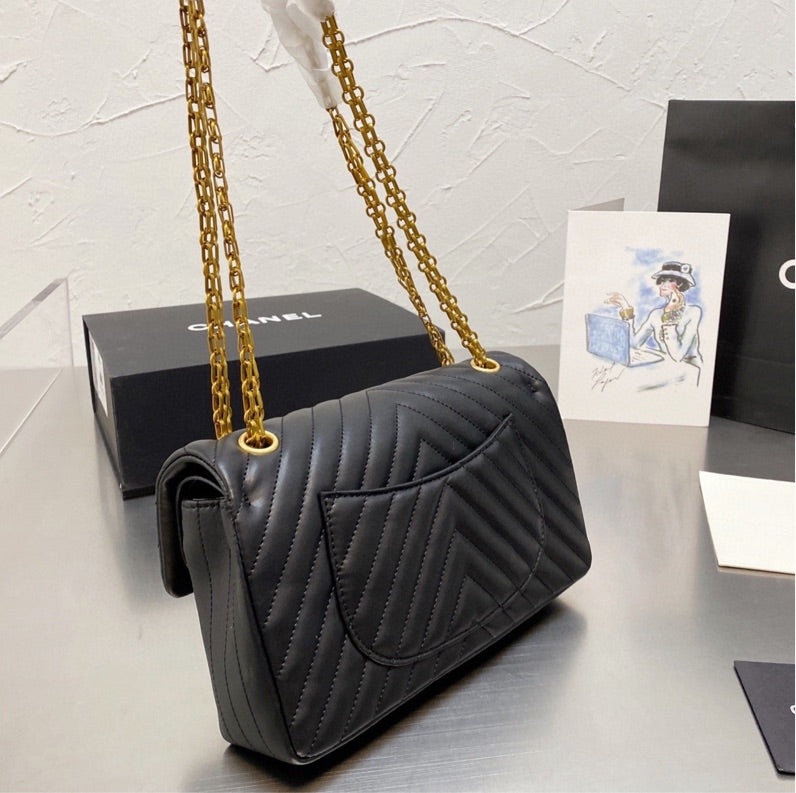 Black  Chanel woman handbag