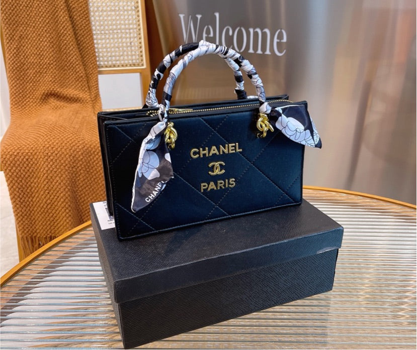 Black  Chanel woman handbag