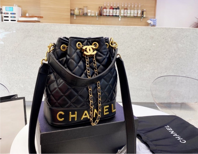 Black  Chanel woman handbag