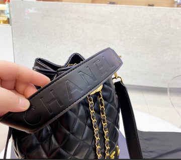 Black  Chanel woman handbag
