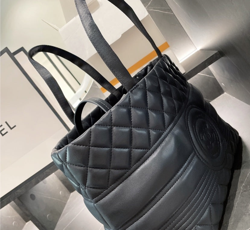 Black leather woman  Chanel handbag