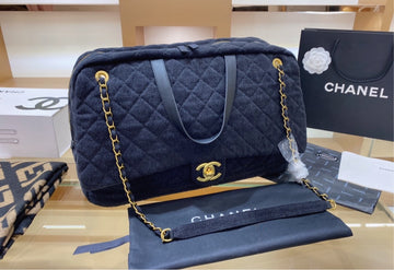Large woman  Chanel handbag