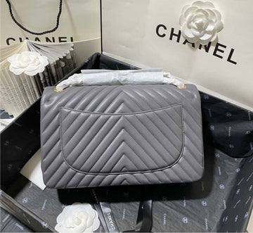 Grey  Chanel woman handbag