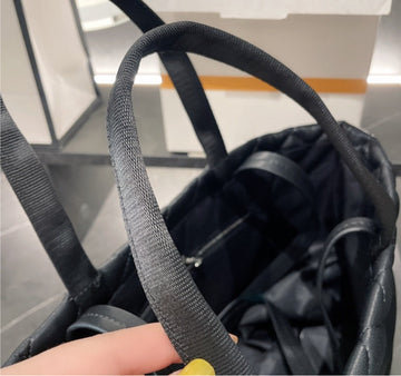 Black leather woman  Chanel handbag