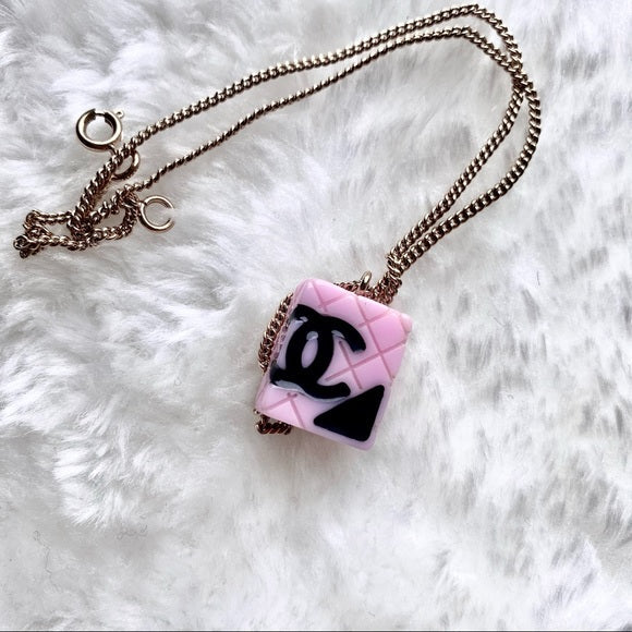 CHANEL pink pendant necklace