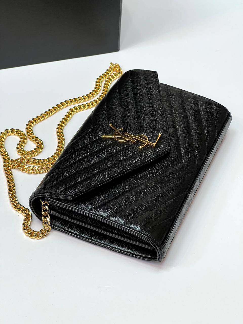 CASSANDRE MATELASSÉ CHAIN WALLET IN GRAIN DE POUDRE EMBOSSED LEATHER