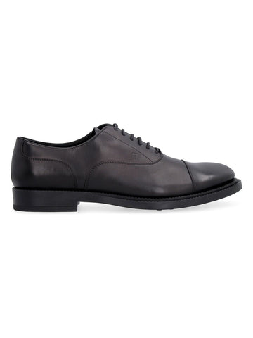 LACE-UPS IN BLACK LEATHER