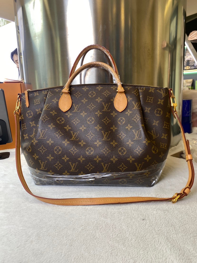 Louis Vuitton Monogram Canvas Artsy Bag Brown