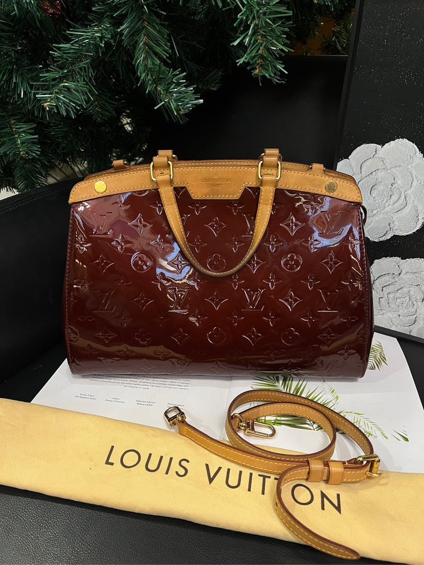 Louis Vuitton Brea  Leather Cherry Handbag